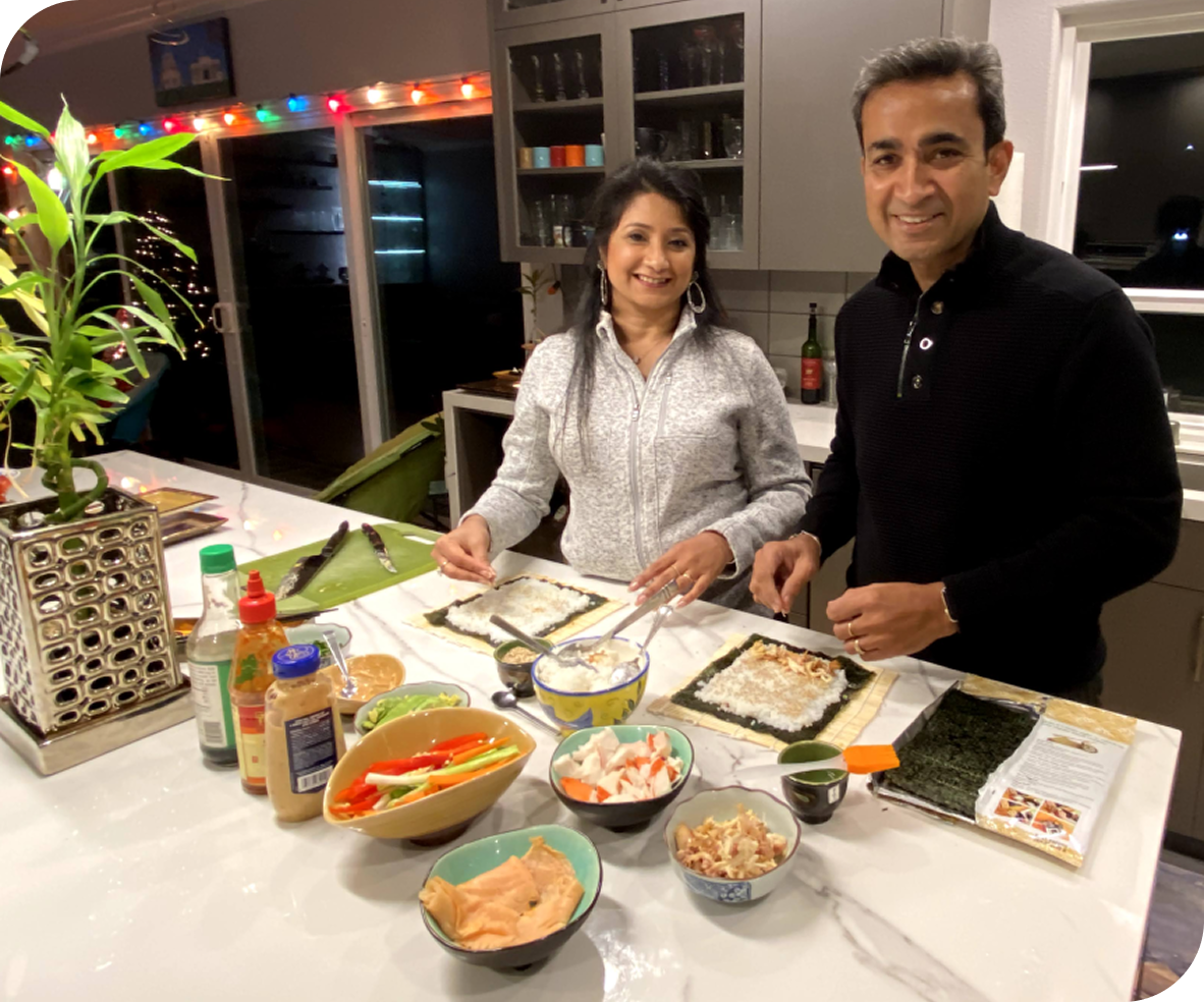 The PuroPlate founders preparing food in the kitchen